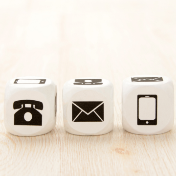 Photo of telephone, mail, and smartphone icons