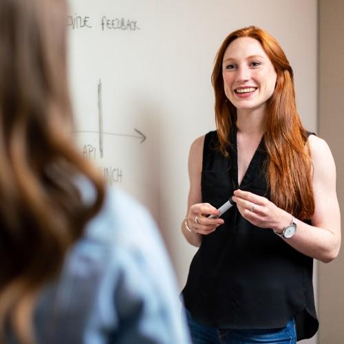 Faculty member provides instruction to a class of students 