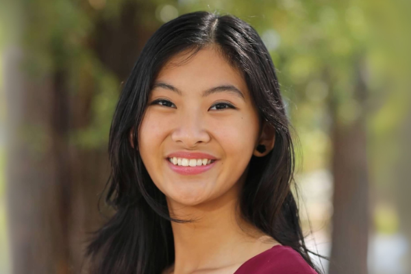 A photo of Kimi Mitsunaga smiling. 