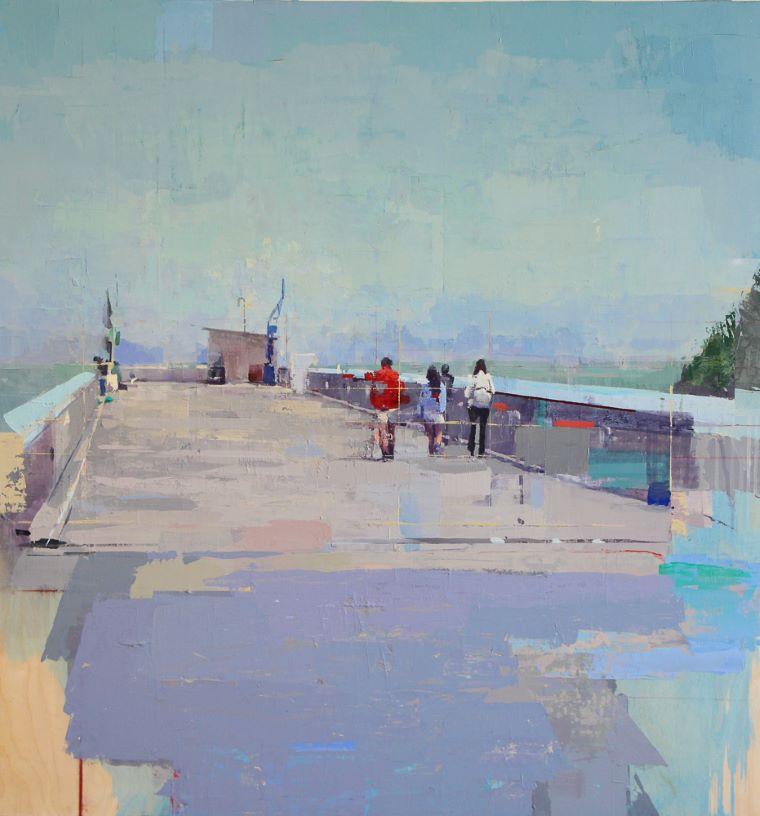 people walking on a ocean wharf