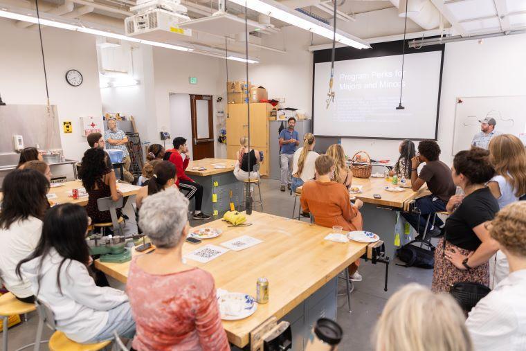 Ryan R giving opening remarks at event