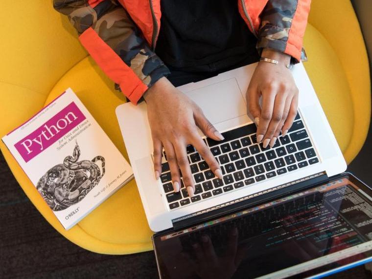 Associate Professor Grace Stokes helps her chemistry students visualize equations by integrating Python coding into her curriculum