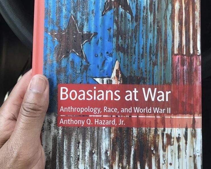 Tony Hazard holding his book