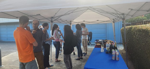 Volunteers interviewAttendees at the Fall Student-Alumni Reception.ing unhoused men and women in an urban park.