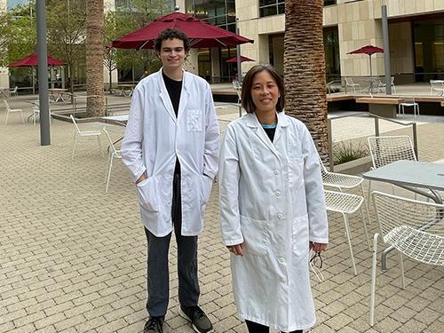Elliott Anderson standing next to Grace Stokes in SCDI