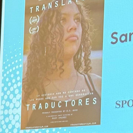 Abel Cruz speaking at the