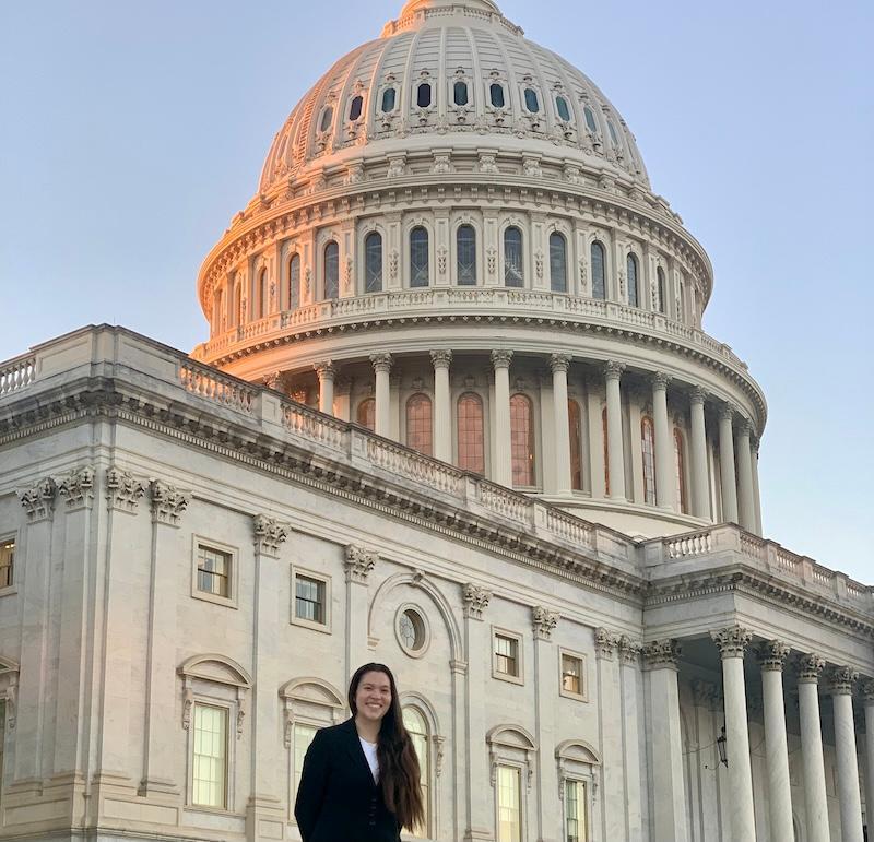 Ariana Yamasaki with the U.S. Capitol in the background.