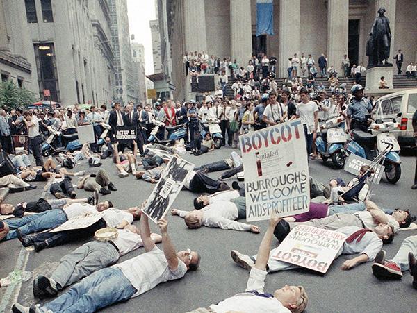 People lying on the street during a Wall Street protest.