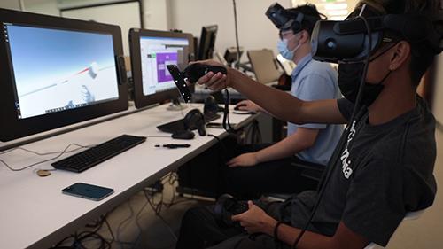 Students using vr headsets in the imaginarium 