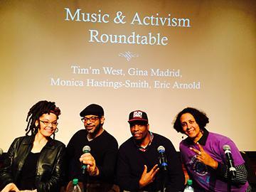 Four people at a Music and Social Justice roundtable event.