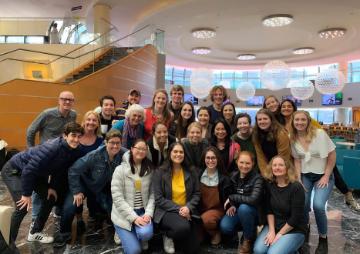 Group photo of New York Alumni 2019 at indoor brunch event.