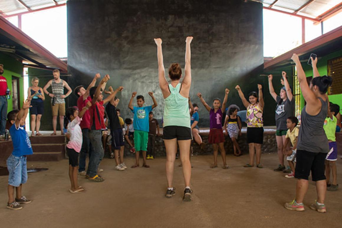 People standing in a theater with arms raised, titled 'Teatro Catalina 2017'.