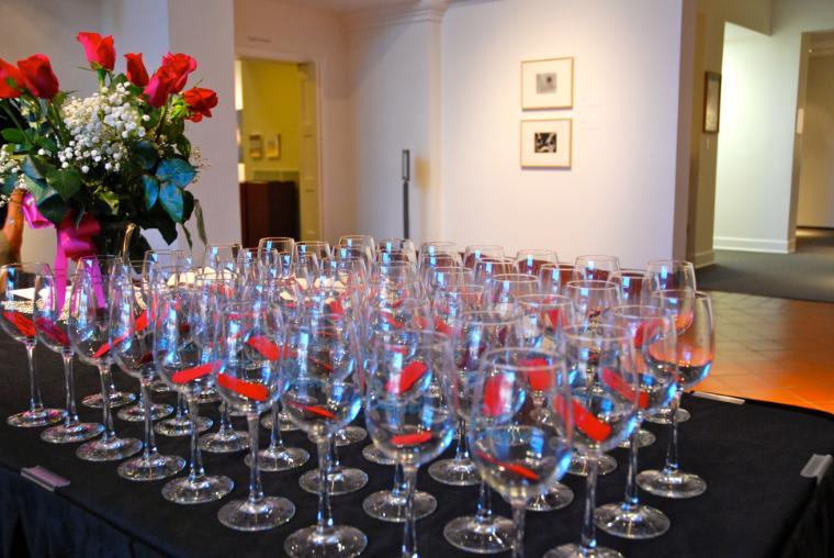 Wine glasses with drink tickets for museum members.