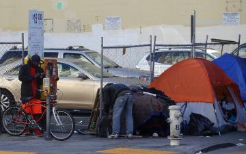 Homeless Man on Bike