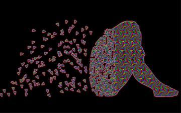 shadow outline of person sitting curled up with with knees drawn