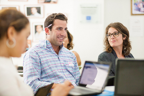 Man and woman with computer in a session.