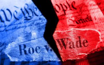 Roe v. Wade torn amidst political polarization. Photo by zimmytws via Adobe Stock.