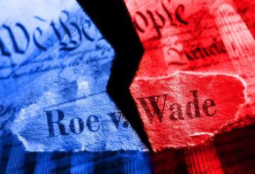 Roe v. Wade torn amidst political polarization. Photo by zimmytws via Adobe Stock.