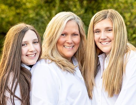 Michele appears with her two daughters, Briana and Kayla 