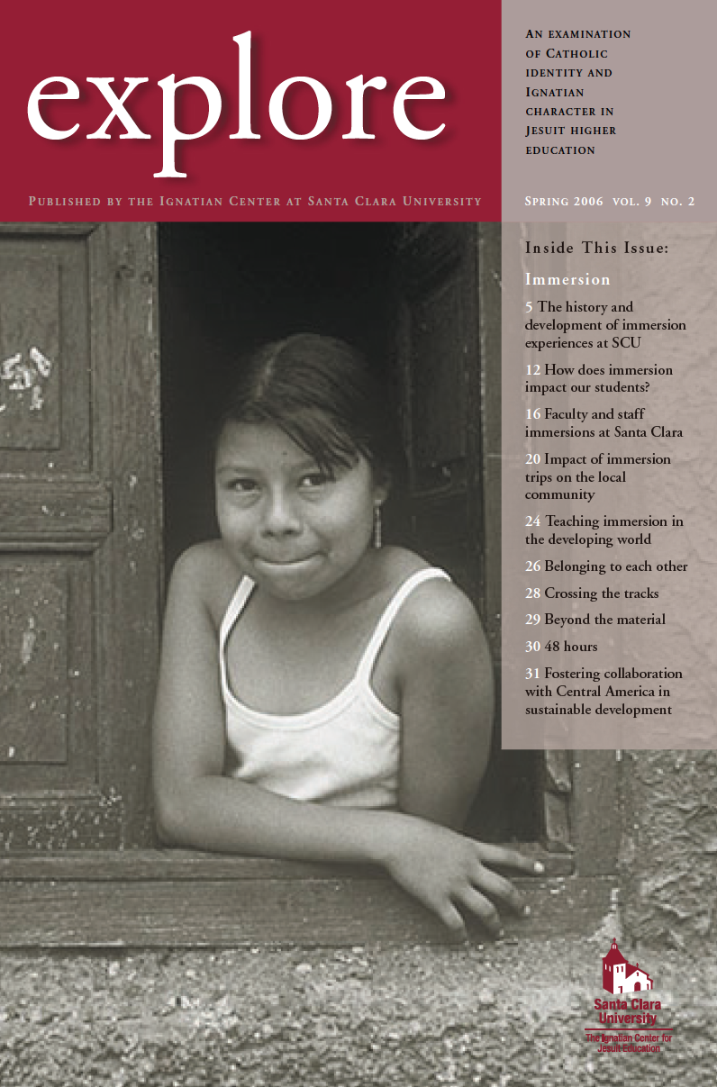 Magazine cover titled explore featuring a girl in a doorway, and text on the right.