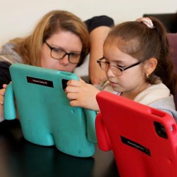 Thriving Neighbor's iPad Program