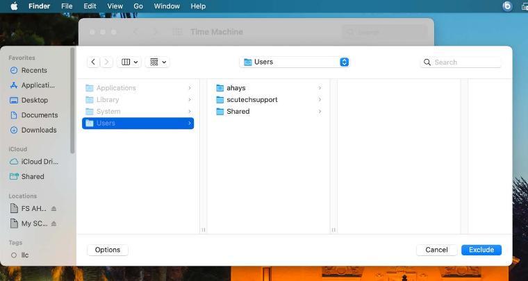 An image of the macOS folder selection screen showing Applications, Library, System and Users in the left side column with Users highlighted.  The middle column shows the folders available in Users (ahays, scutechsupport and shared).