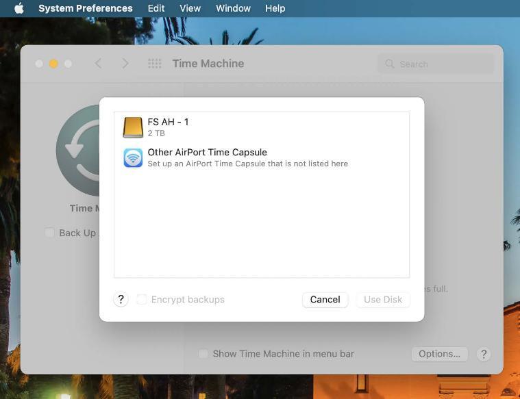 An image of the Time Machine panel showing a selection list to choose a backup location.  List includes FS AH - 1 external hard drive and Other AirPort Time Capsule.