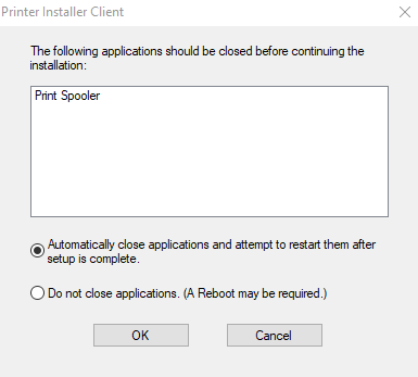 An image of the Windows message warning the Print Spooler is still running with the option Automatically close applications selected with the available buttons OK and Cancel.