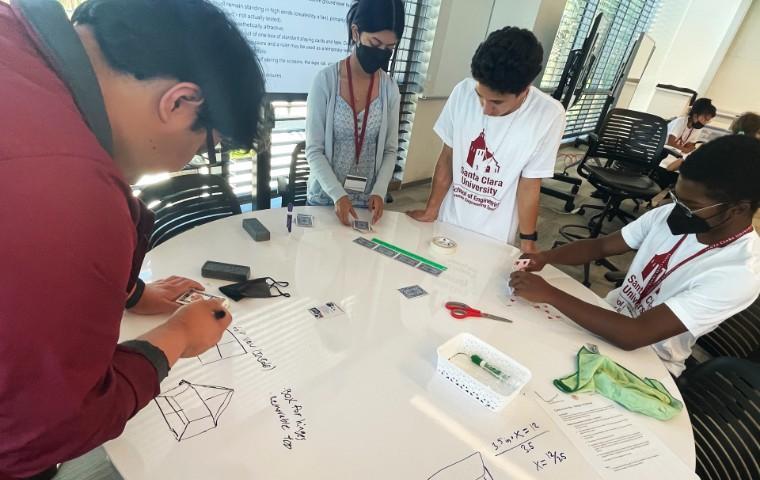 SES Engineering Students around table