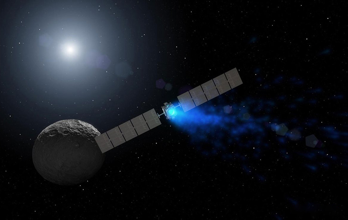 Artists rendering of NASAs Dawn spacecraft orbiting dwarf planet