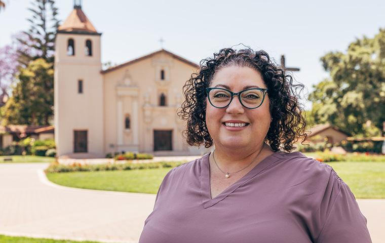 photo of incoming GPPM executive director Melissa Ursin in front of Mission Church