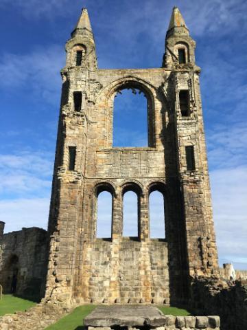 Ruins of St. Andrews Shrine against a blue sky.