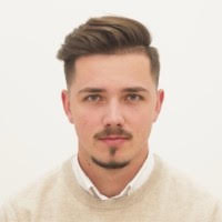 Man in white sweater