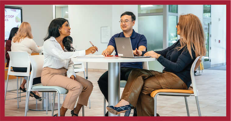 Business Professionals meeting to discuss custom program options right for their organization