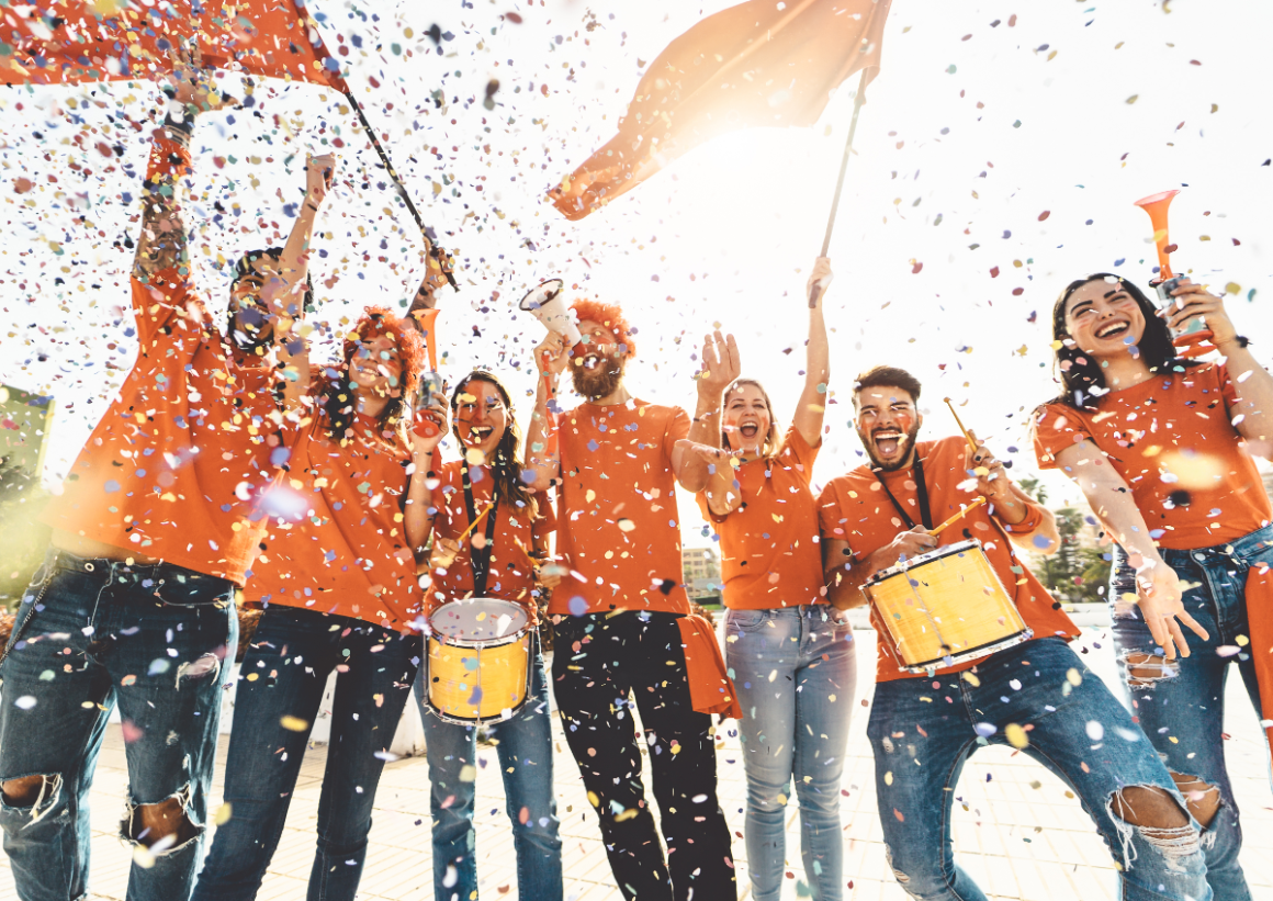 Fan engagement staff celebrating with confetti