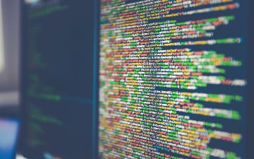 Computer monitor with lines of programming code 