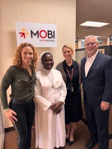 Photo MOBI Team w HHCJ Sr. Rosemary (Vertical)