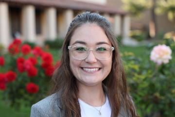 A close-up image of a smiling woman