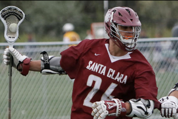 A lacrosse player in a red jersey with Santa Clara text.