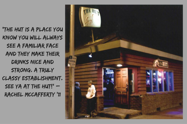 Text reads The hot kitchen was run by Isabella Summers, AKA Chainsaw Bunny, and The Press War. Dinner Party was catered byTable 3 event catering. Here are some party pics from our night at The Hut. Image shows a wooden hut with neon lights.