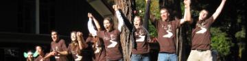 Students jumping off wall at Search Retreat 