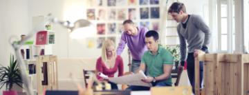 A family unpacking boxes in a new home.