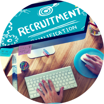 Person working on a computer with 'Customize Recruitment' on screen.