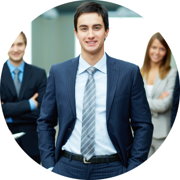 Several students in professional attire posing together.