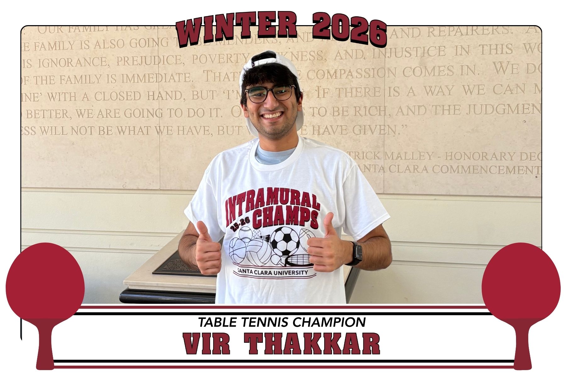 Photo of IM Table Tennis champs, Vir, posing in Malley with his championship t-shirts.
