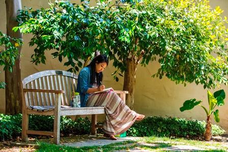Student on a Bench
