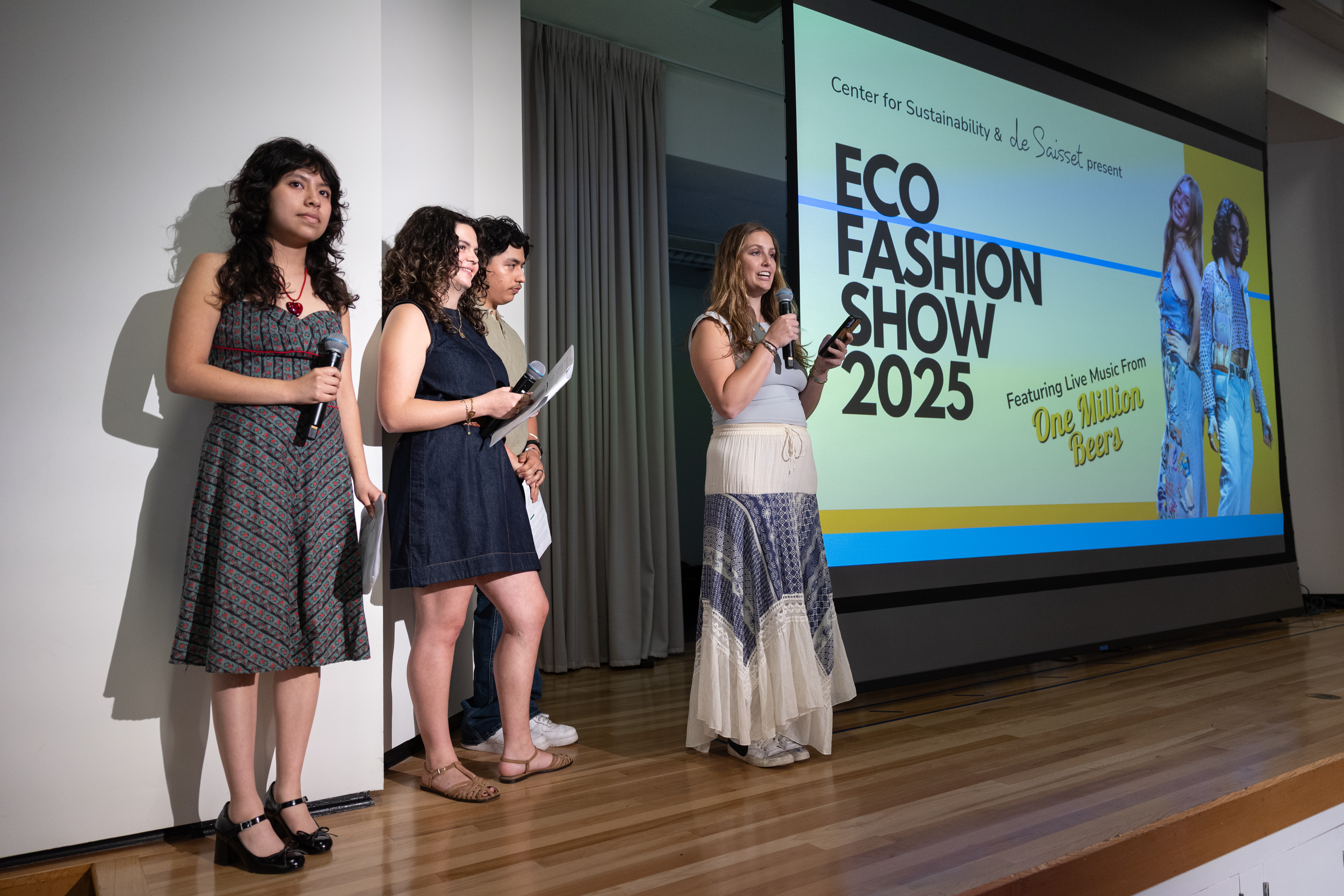 EcoFashion Show 2025: A designer speaking on stage