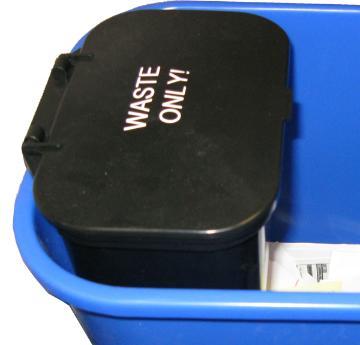 Blue waste bin with a Waste Only label on the lid.