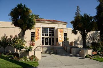 The de Saisset Museum building with trees and a pathway.