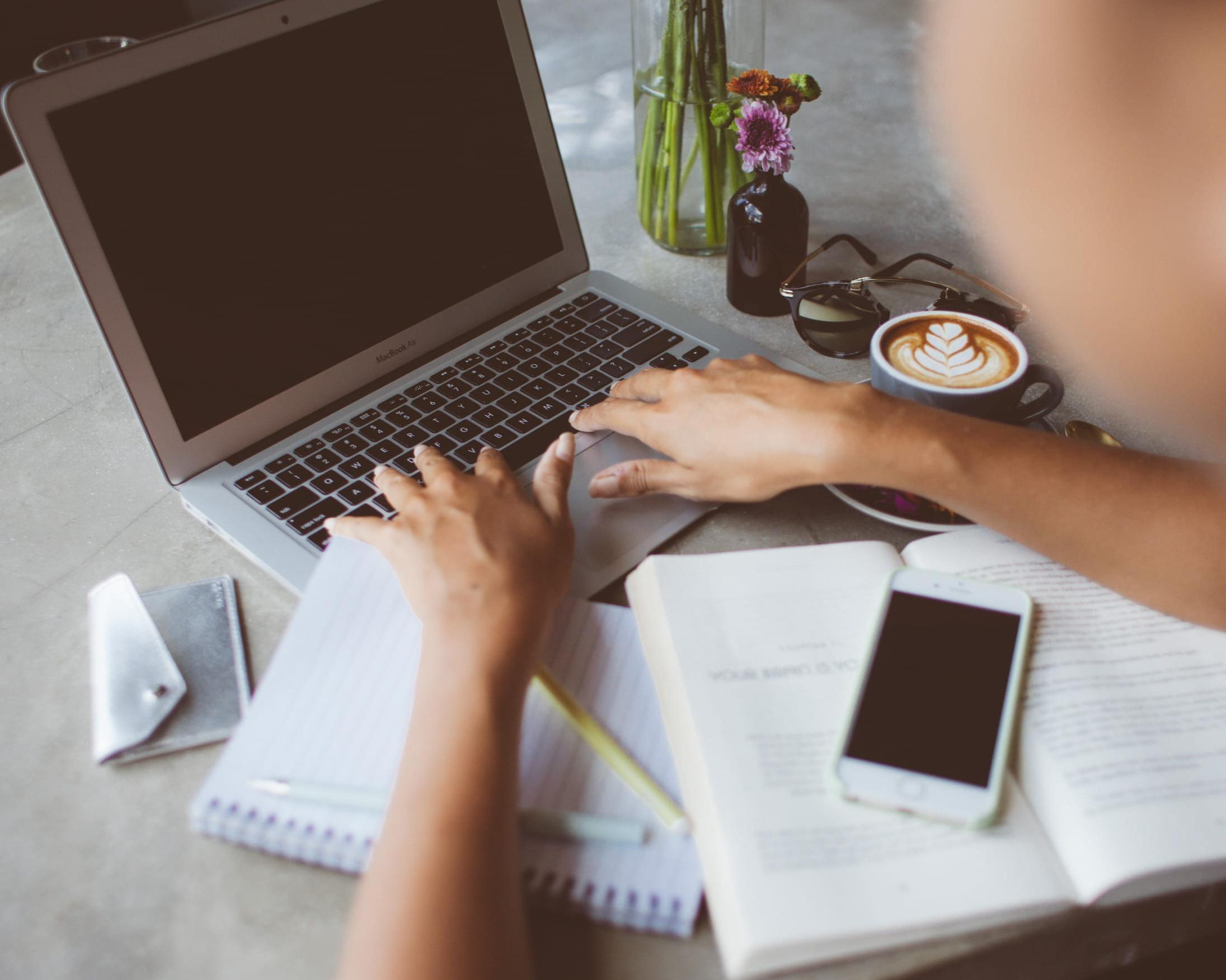 writer at work, closeup, laptop